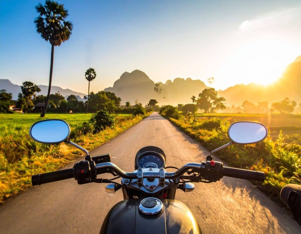 big bike on an open road during an epic 15-day Thailand Laos motorcycle tour